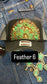 BLACK FEATHER TRUCKER HAT