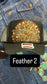 BLACK FEATHER TRUCKER HAT