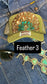 GREEN FEATHER TRUCKER HAT