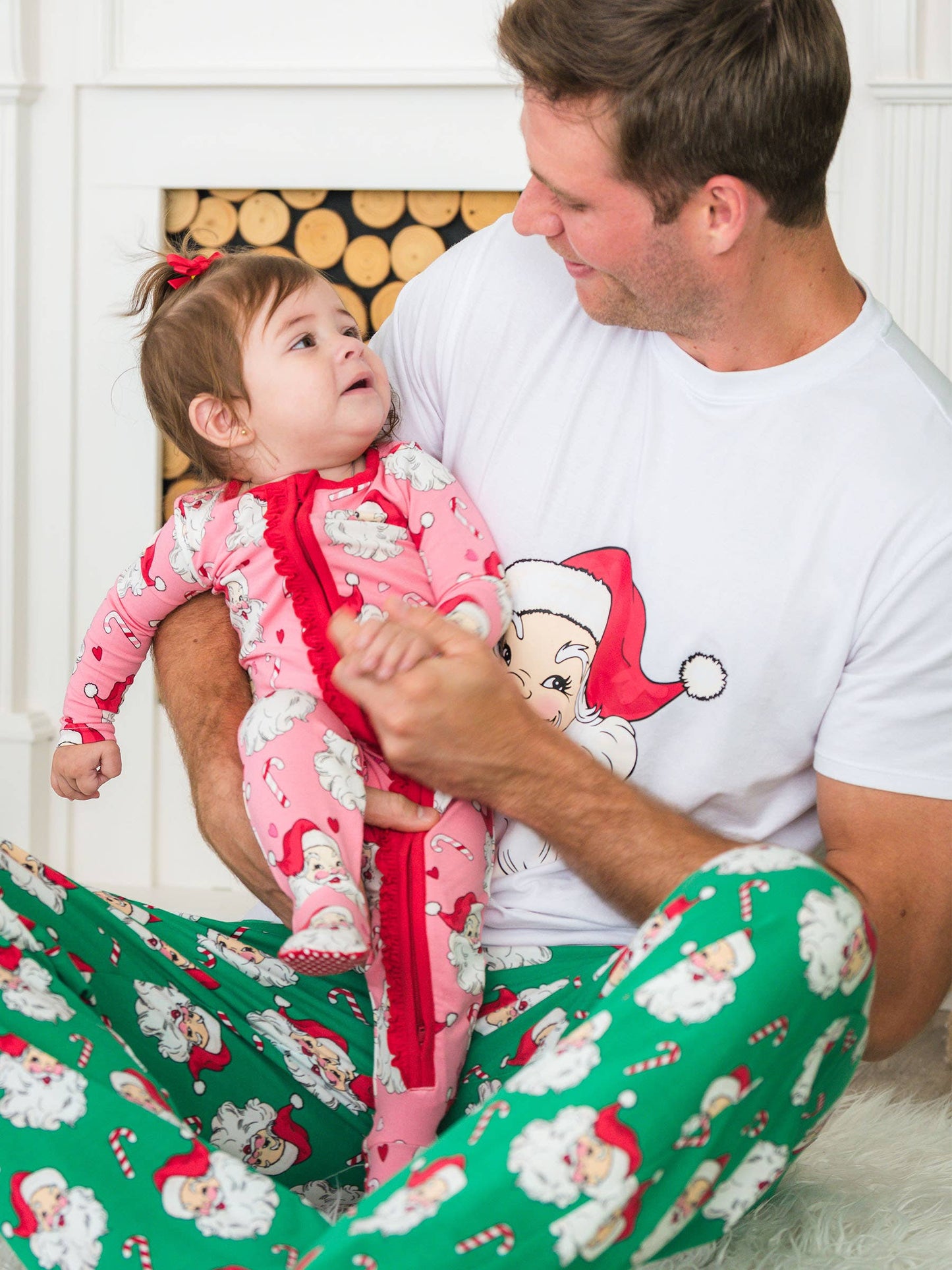 RuffleButts SoftSnooze™ Baby Girls Cotton Modal Pink Santa Joy Footed Ruffle One Piece Pajama