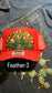 RED FEATHER TRUCKER HAT